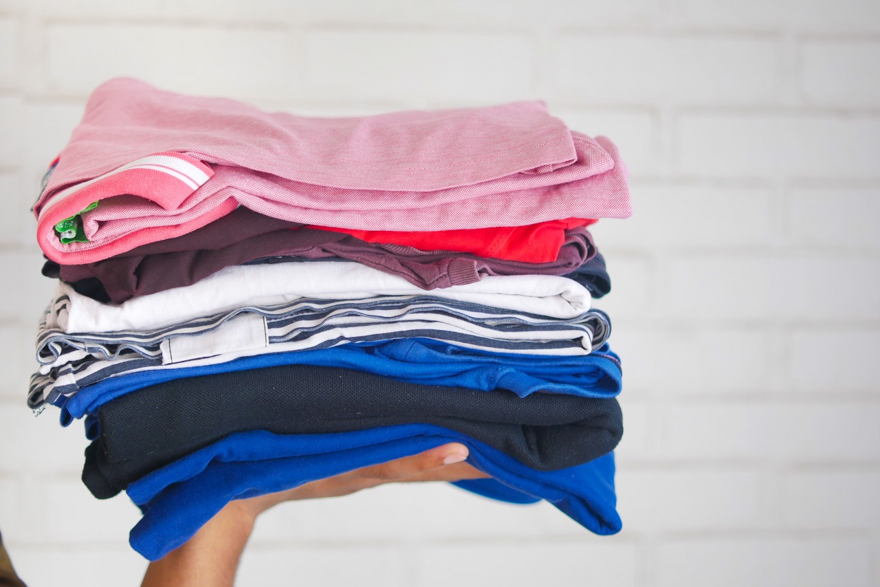folded clothes stack of folded clothes