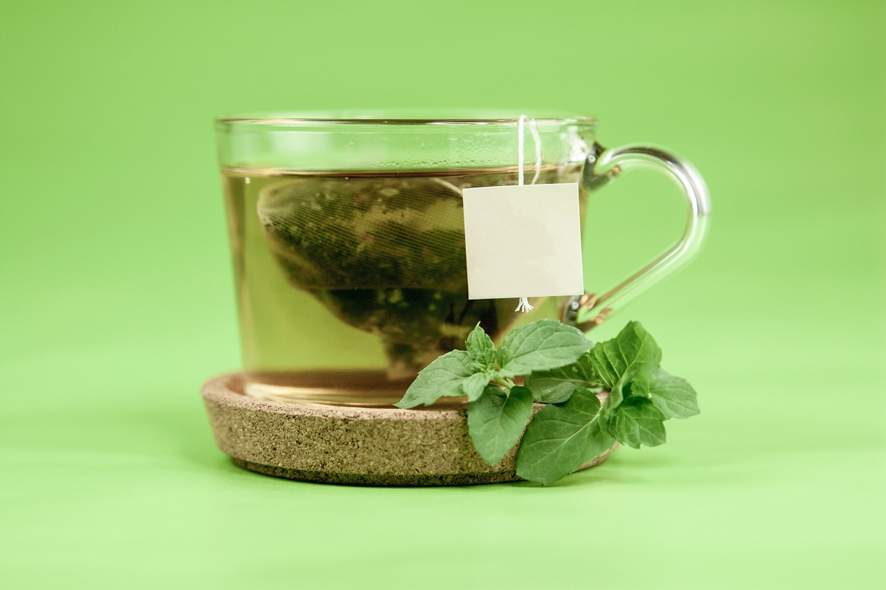 green tea and leaves