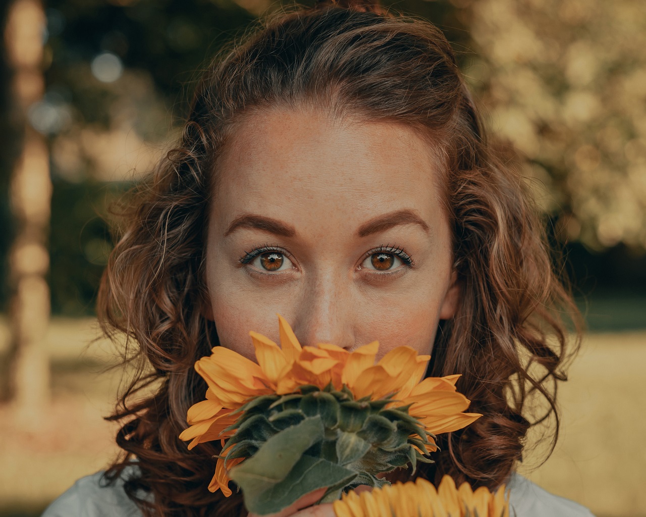 lady smelling flowers