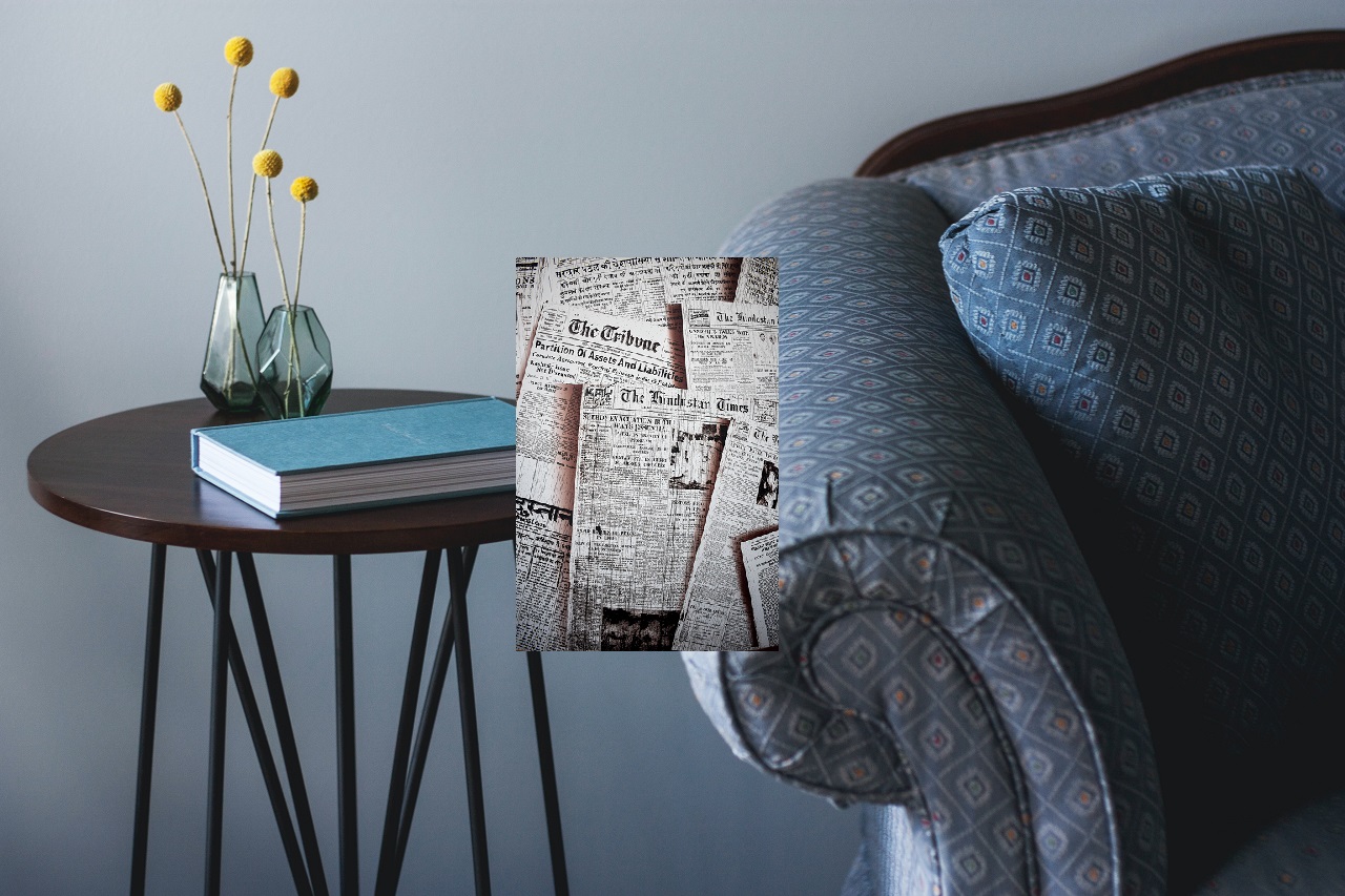 sofa and newspaper sofa and newspaper