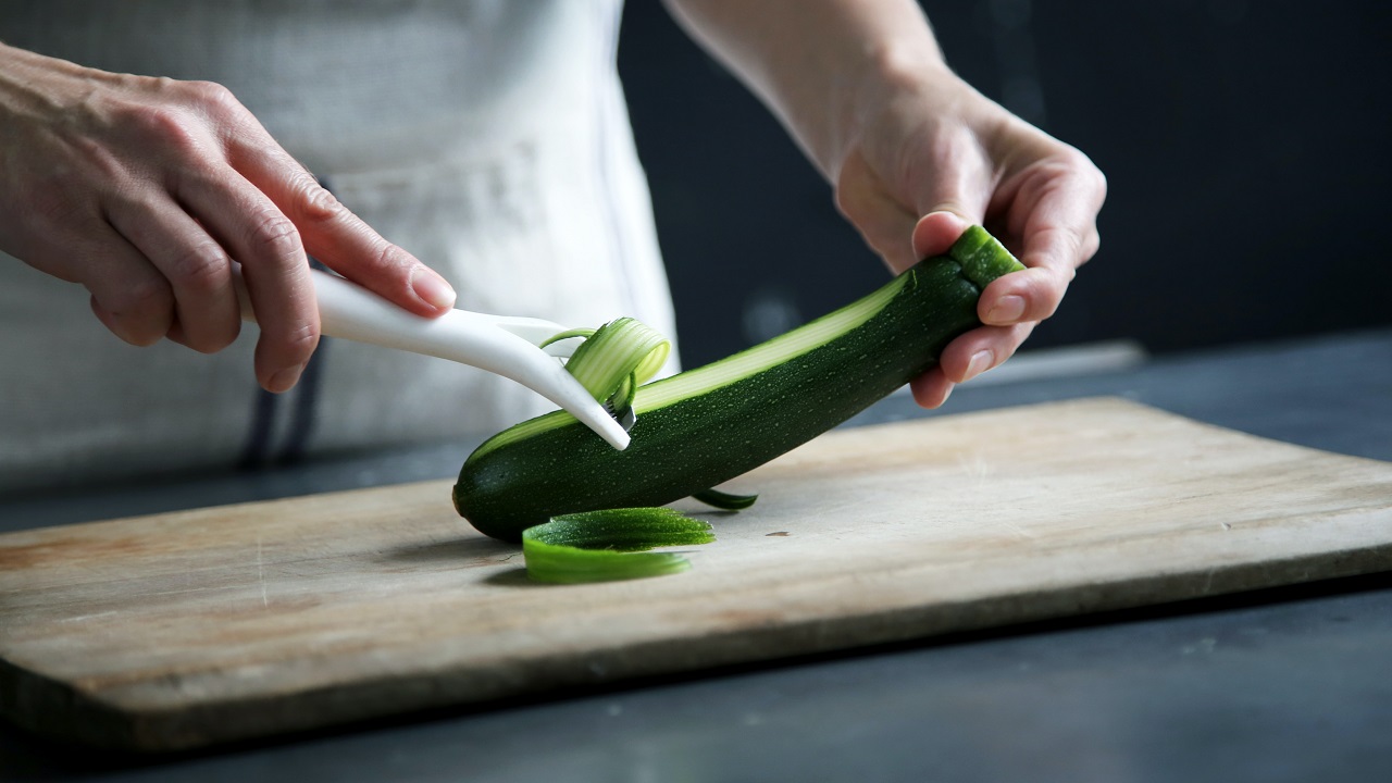 peeling a cucumber