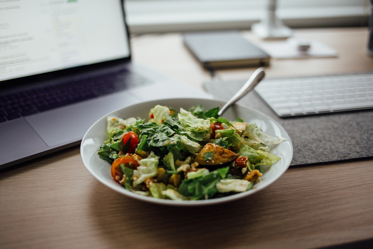 bowl of salad on desk bowl of salad