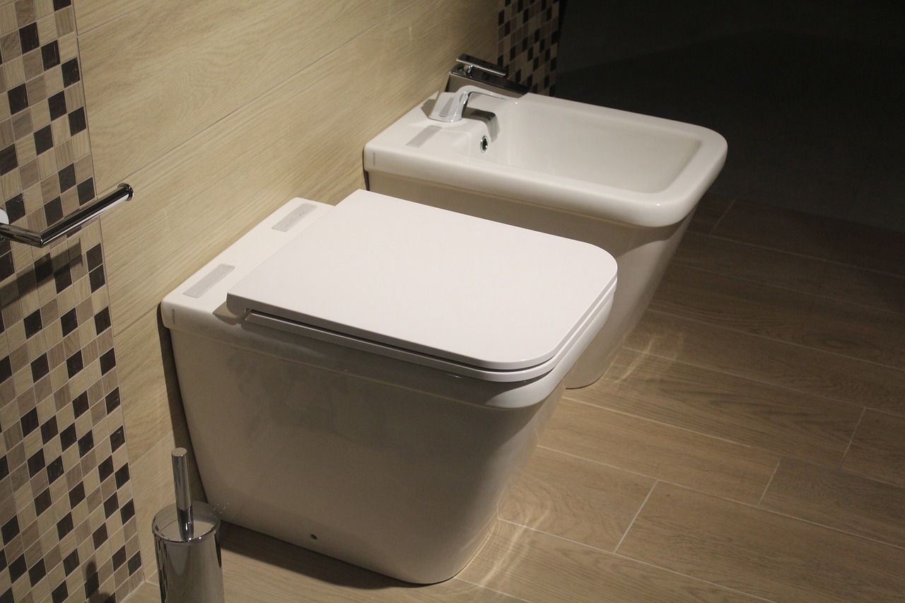 basin and commode in a bathroom