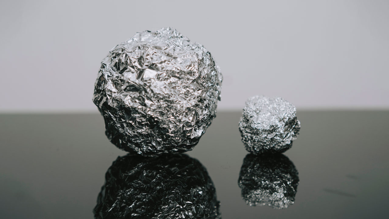 2 aluminum balls on the table