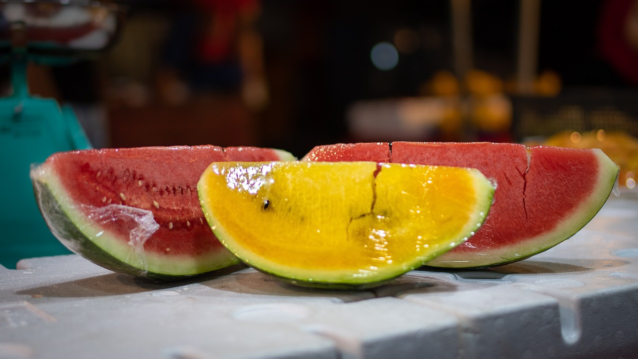 slices of yellow and red watermelon