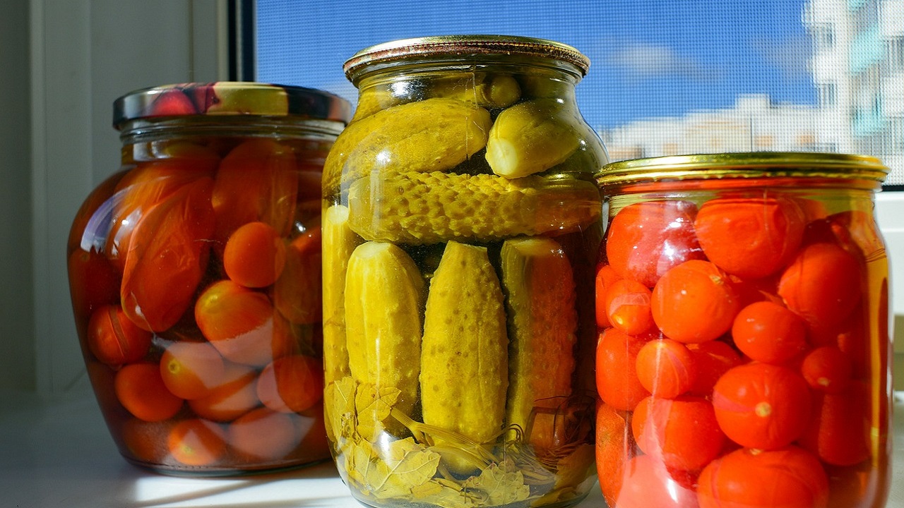 3 jars with variety of vegetables