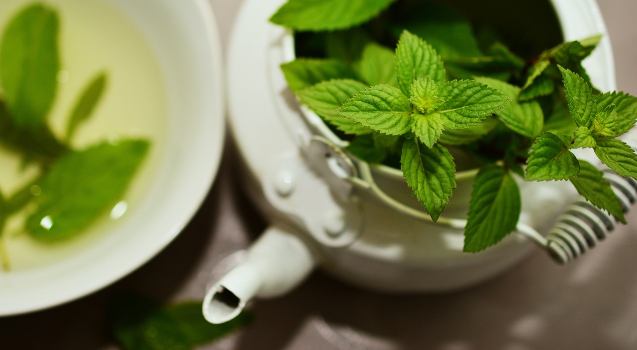 boiling the mint leaves and putting in a pot