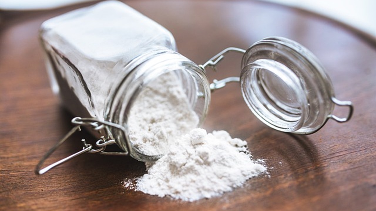 flour won't harm the sink's surface and effective at removing bad odors