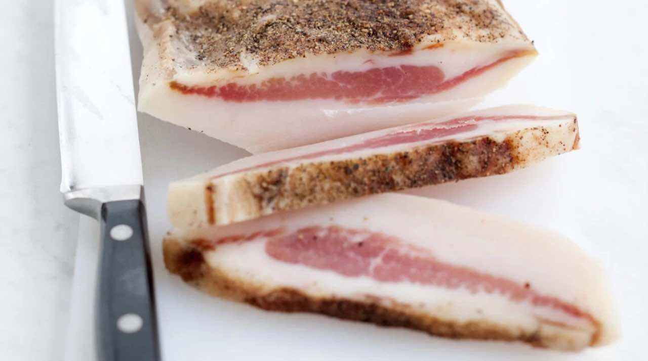 cut guanciale into slices