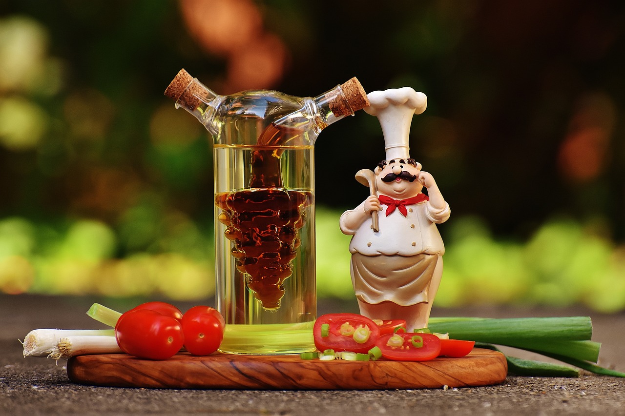 a vinegar bottle is placed on a cooking table