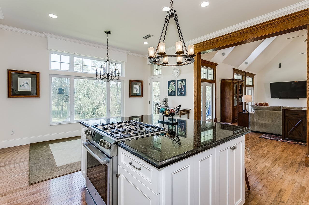 an oven with clean hob knobs is placed in the kitchen