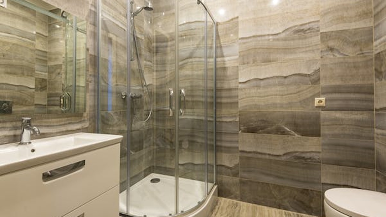 a clean shower area of the washroom