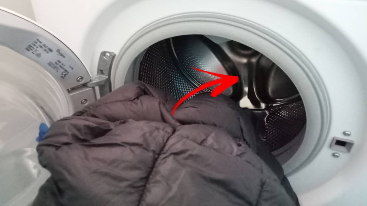 You should use cold water and select a delicate program for washing jackets.