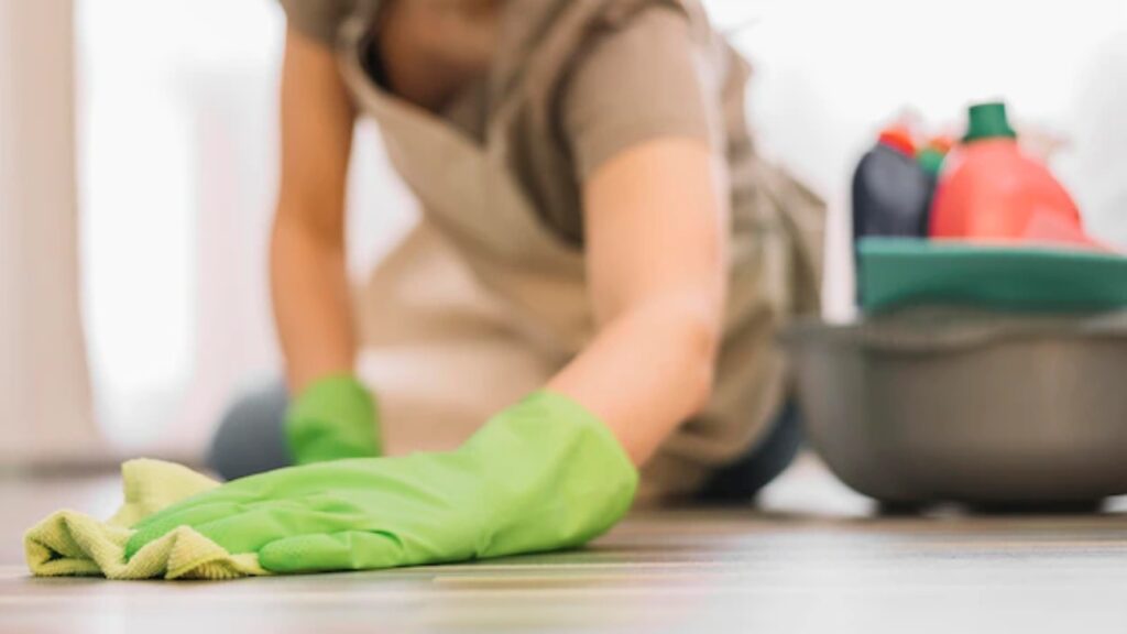 a women cleaning the floor