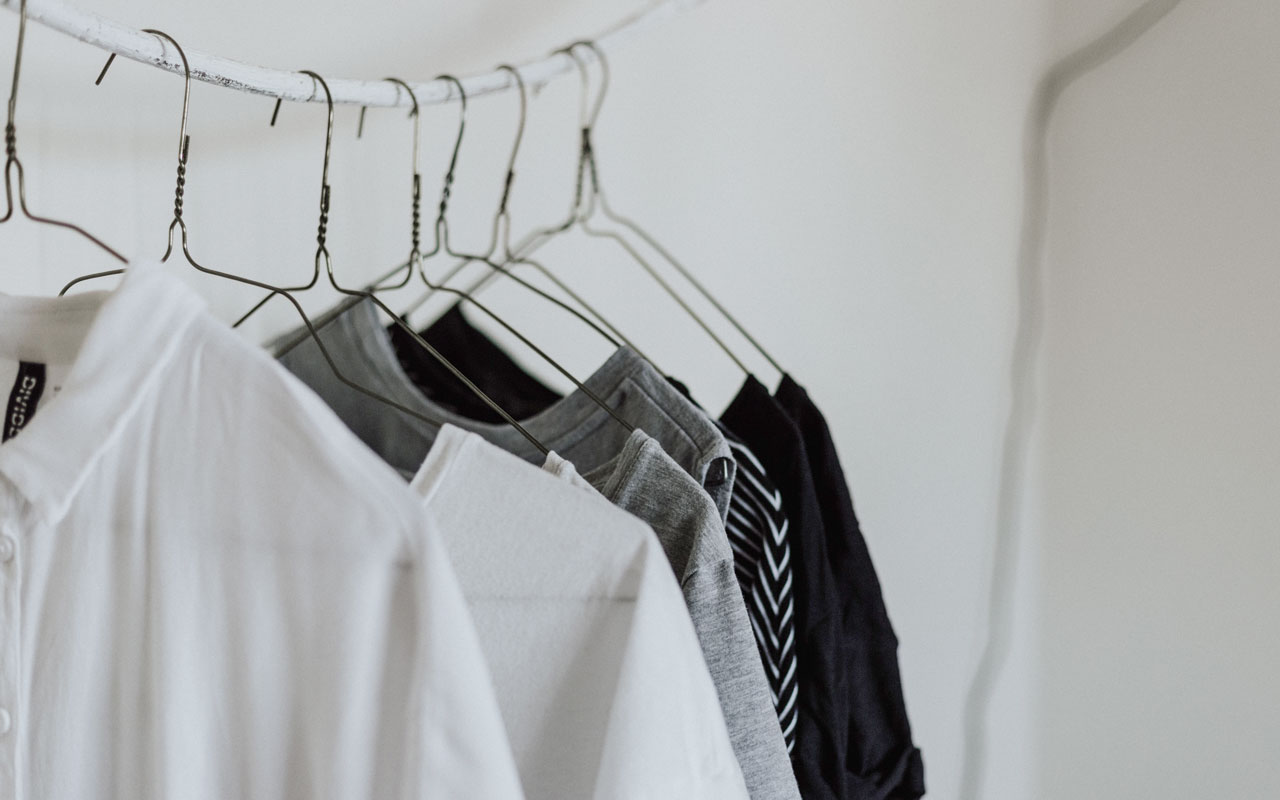 use metal clothes hangers to remove hair in the shower drain