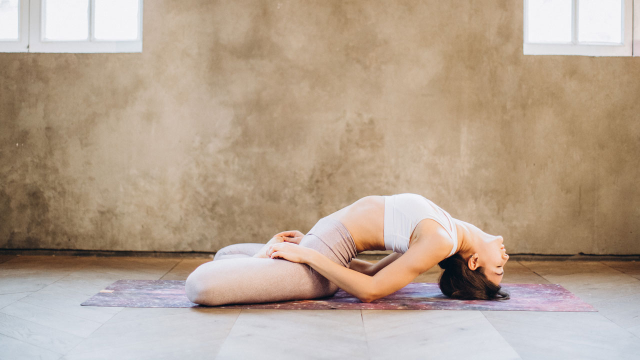 Fish pose stretches your spine and muscles and helps in achieving a body-brain balance