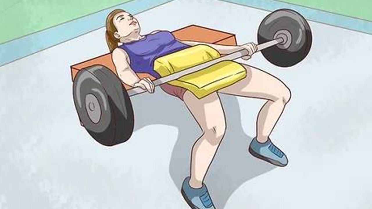 a girl is doing hip thrust exercise