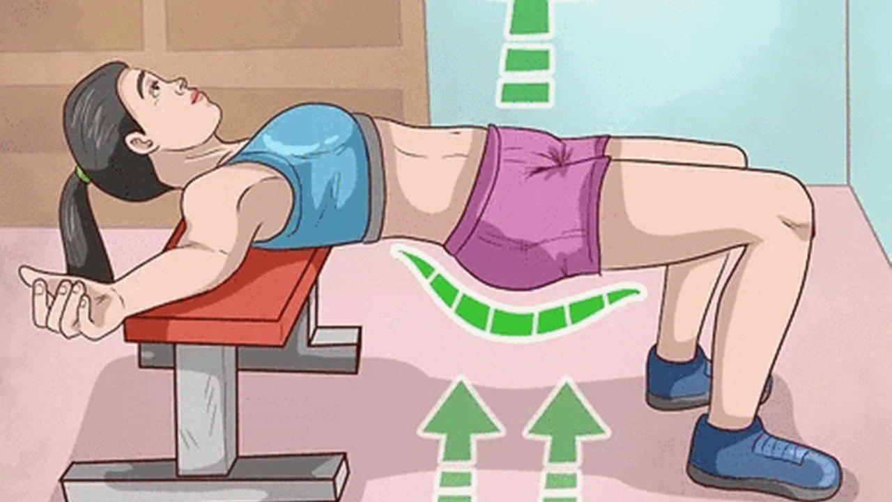 a girl is doing hip thrust exercise