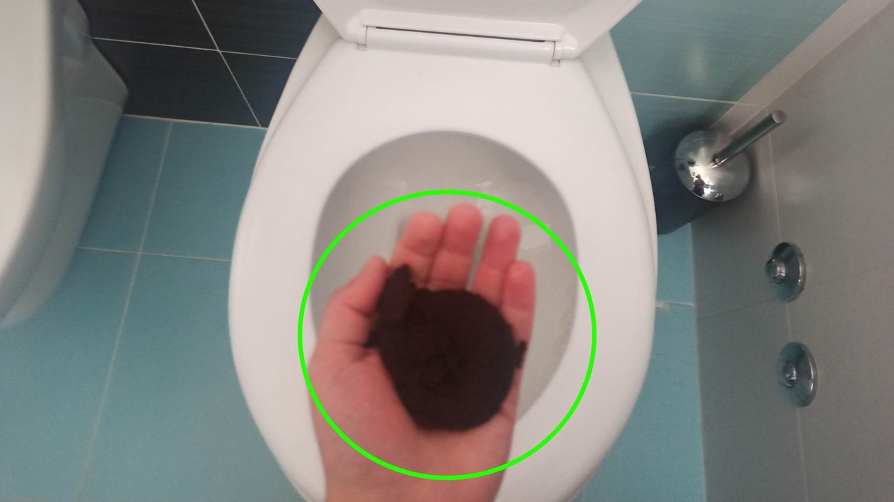 putting mixture in the toilet