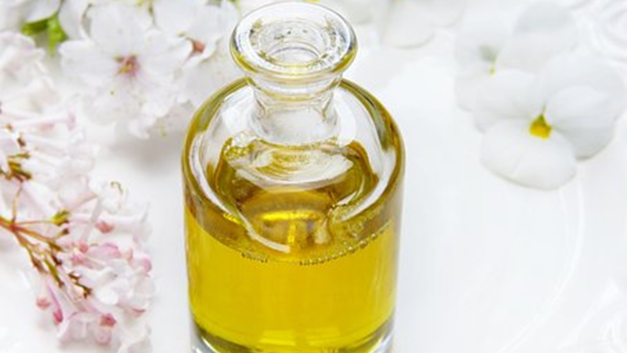 prepared perfume in a jar placed on a table