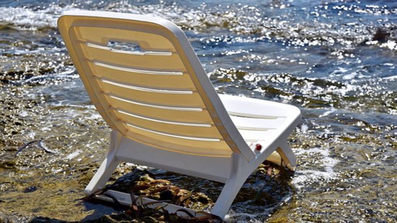 a clean chair on the beach side