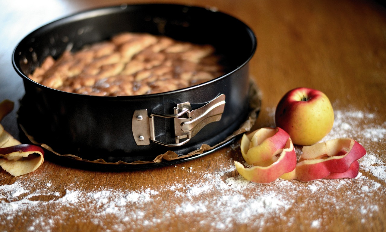prepared apple pie material in a pan, ready to be baked