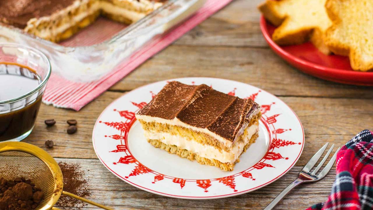 a piece of Pandoro tiramisu is served in a plate