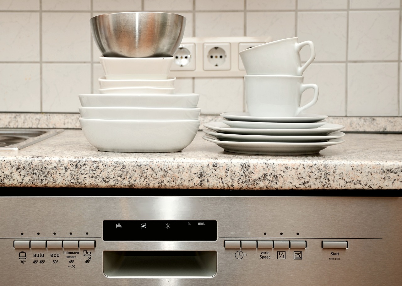 clean plates and cups after washing in the dishwasher